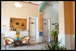 Posezení v ubytování Hotel Eros + 37 fotografií