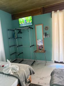 TV a/nebo společenská místnost v ubytování cabina DiTi 2