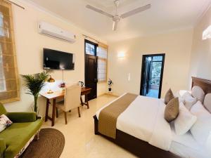 Et tv og/eller underholdning på South Delhi Residency, South Extension New Delhi + 57 billeder