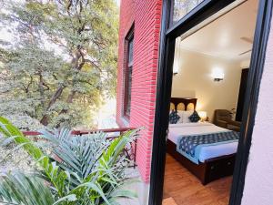 En eller flere senge i et værelse på South Delhi Residency, South Extension New Delhi