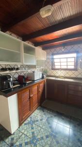 Køkken eller tekøkken på Casa de Temporada Centro Búzios + 11 billeder