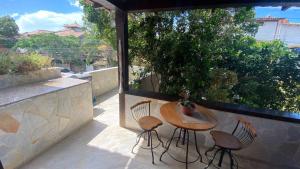 En balkon eller terrasse på Casa de Temporada Centro Búzios
