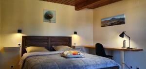 En eller flere senge i et værelse på Plumeria 1