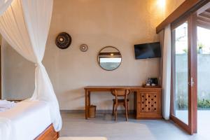 TV a/nebo společenská místnost v ubytování Akar Villa