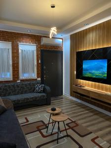 Et tv og/eller underholdning på Central Stay with a View