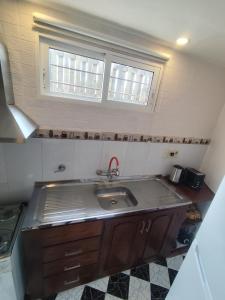 Kuchyň nebo kuchyňský kout v ubytování Arenas del Diablo