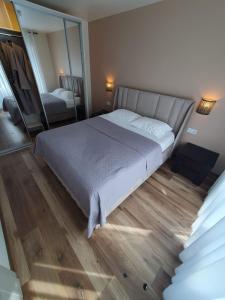 Postel nebo postele na pokoji v ubytování Žolynų namai