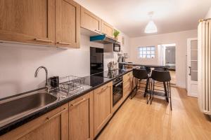 Køkken eller tekøkken på L'Armonia en plein centre de Mordelles