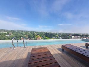 Swimmingpoolen hos eller tæt på EG12 Playa Grande Aloha Host