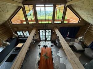 an overhead view of a living room in a tree house at Amber Hills Romania in Braşov