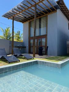 Swimmingpoolen hos eller tæt på Bangalo beira-mar Praia do Frances