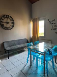 Et opholdsområde på Appartement au porte de Geneve