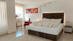 En eller flere senge i et værelse på Royal Appartements Sölden