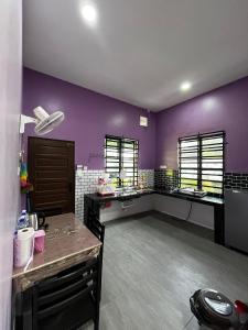 Køkken eller tekøkken på AZZR Homestay