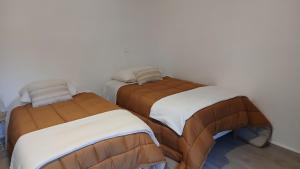 En eller flere senge i et værelse på VILLARGONDRAN vélos en Maurienne garage motos + 20 billeder