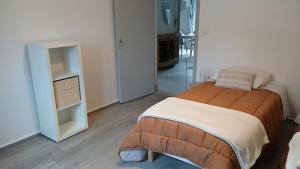 En eller flere senge i et værelse på VILLARGONDRAN vélos en Maurienne garage motos