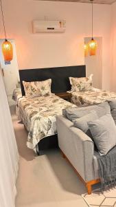 Una cama o camas en una habitación de Studio Brisa