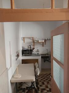 Kuchyň nebo kuchyňský kout v ubytování Sol, Terra e Mar- No coração do Plateau