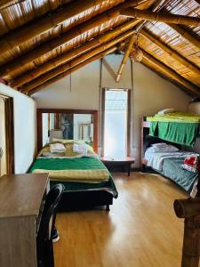 Postel nebo postele na pokoji v ubytování cabaña hotel oasis