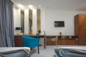 Et tv og/eller underholdning på Old Town Boutique Hotel