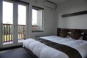 Postel nebo postele na pokoji v ubytování Chalet Fuyuri