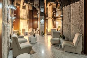 a salon with chairs and a waiting room at Stillaterm SPA in Mineralni Bani