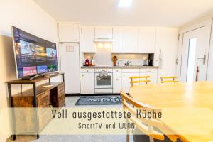 Køkken eller tekøkken på Gemütliche Souterrainwohnung mit gratis Parkplatz