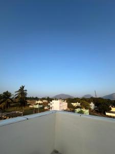 a view of the city from the roof of a building at Nayana comforts in Nandigunda