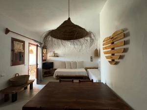 a living room with a couch and a table at Michel Dos apartamentos in San Ferrán de ses Roques +182 photos