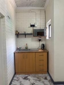 Køkken eller tekøkken på Liya Self Catering