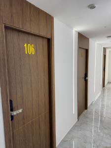 a door with the number on it in a hallway at Hôtel kairouan in Fez