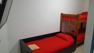 En eller flere senge i et værelse på COMPLEJO Aires del Ñapindá