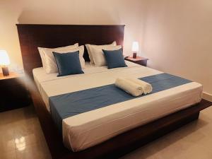 Postel nebo postele na pokoji v ubytování Ayana Resort Wilpattu