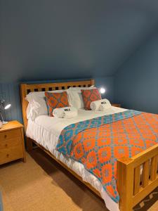 En eller flere senge i et værelse på Erw Fair