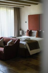 En eller flere senge i et værelse på Ca' del Moro Wine Retreat