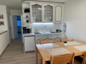 Kuchyň nebo kuchyňský kout v ubytování Ferienapartment TESLA im Wellnesshotel - Bayerischer Wald