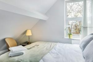 Giường trong phòng chung tại West Bridgford Comfort Quality Suites