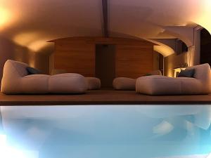 two beds sitting on a shelf in a room at Cuprena in Arezzo