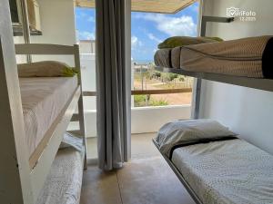 Giường trong phòng chung tại Les Diablettes