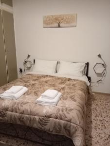 En eller flere senge i et værelse på SEA NEST in Artemis