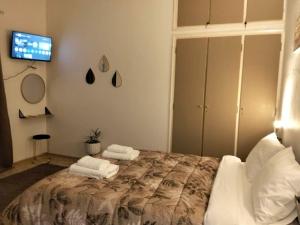 En eller flere senge i et værelse på SEA NEST in Artemis