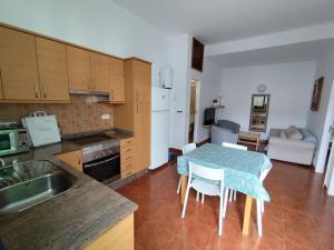 Køkken eller tekøkken på Sabbia Suites El Muellito