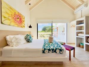 Postel nebo postele na pokoji v ubytování Casa Frente al Mar San Andrés Piscina Privada