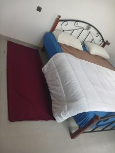 En eller flere senge i et værelse på Villa DOODA superbe vue sur l'Atlas