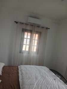 En eller flere senge i et værelse på Villa DOODA superbe vue sur l'Atlas