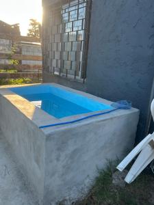 Bazén v ubytování Cuchilla Alta-La Cabaña Celeste nebo v jeho okolí