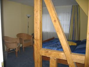 Postel nebo postele na pokoji v ubytování Pension & Ferienhaus Latröpchen