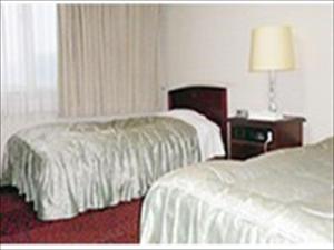 Postel nebo postele na pokoji v ubytování Hotel CROWN HILLS MIYOSHI