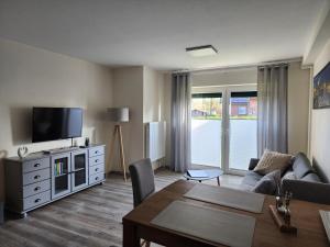 Et tv og/eller underholdning på Pension Heuer + 74 billeder