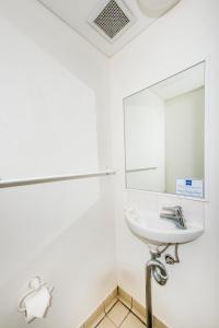 ibis budget Windsor Brisbane tesisinde bir banyo